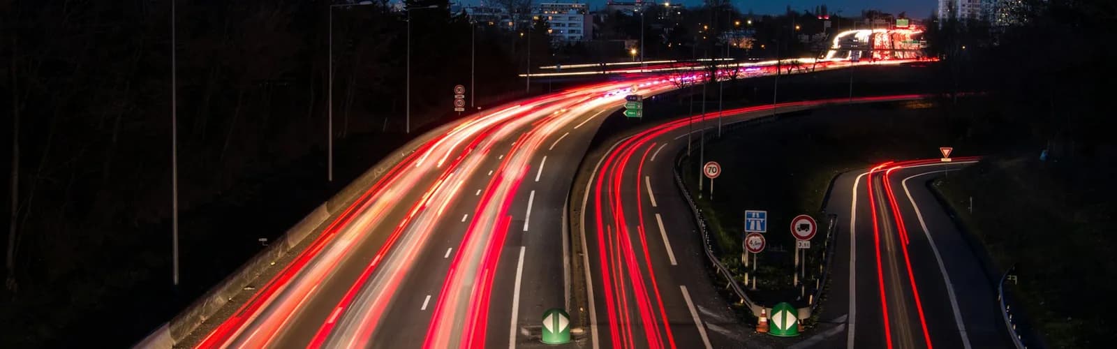 Long-exposure light trails of traffic flowing at dusk
