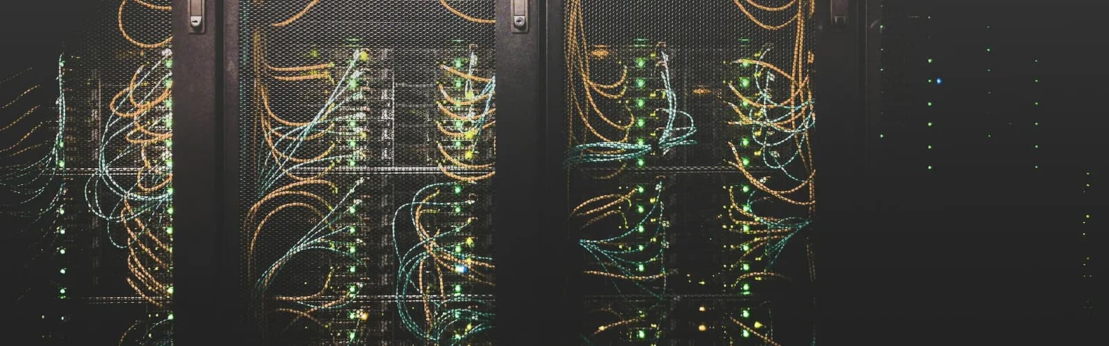 Server racks with network cabling and a soft LED glow